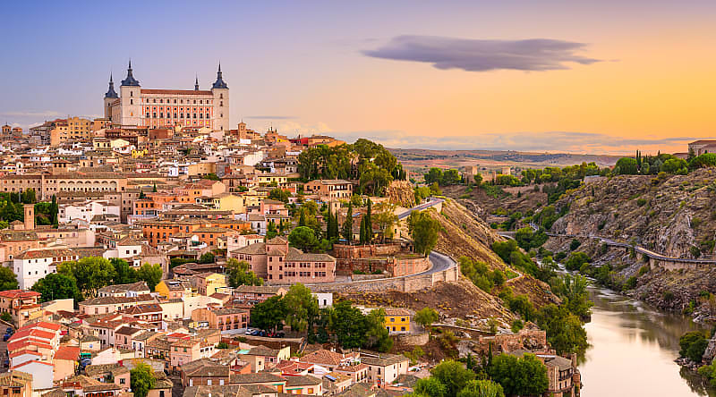 View of Alcazar and Tagus river in Toledo, Spain View of Alcazar and Tagus river in Toledo, Spain