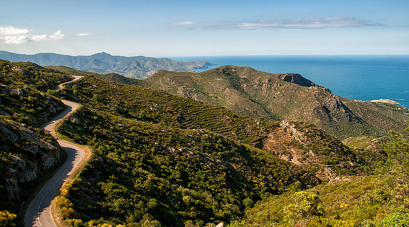 Winding road through mountains in the coast of Cap de Creus, on the way to Girona, Spain, Winding road through mountains in the coast of Cap de Creus, on the way to Girona, Spain,