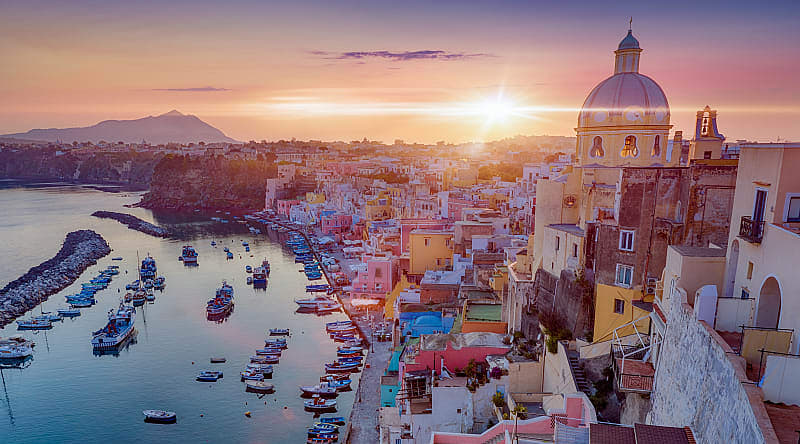 Prodica, Italy Romantic sunset over Procida, one of the Flegrean Islands off the coast of Naples in southern Italy