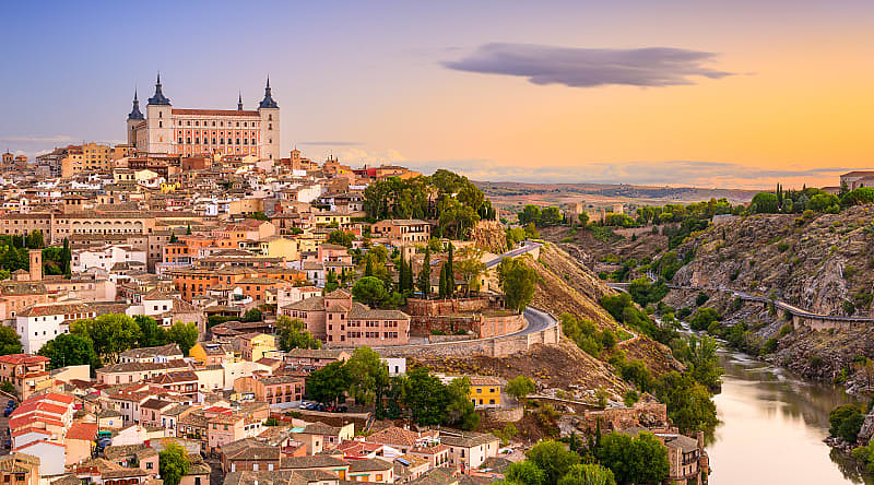 View of Alcazar and Tagus river in Toledo, Spain View of Alcazar and Tagus river in Toledo, Spain