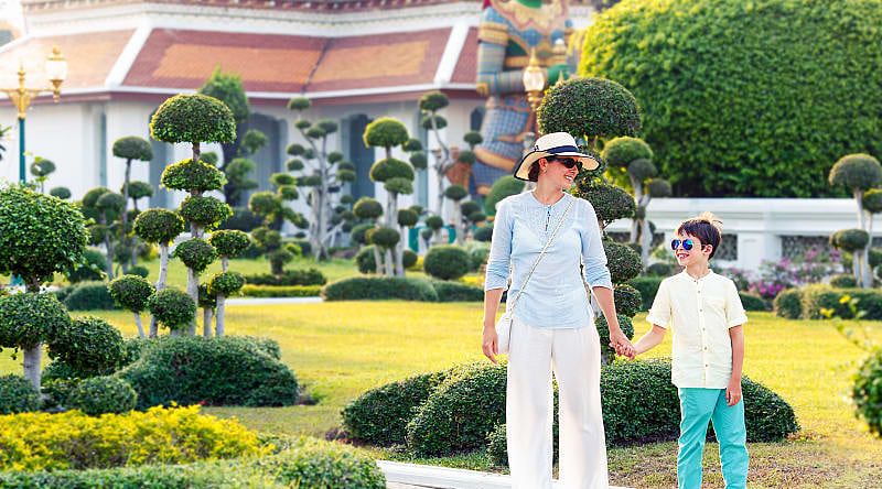 Wat Arun in Bangkok, Thailand Mother and son at Wat Arun in Bangkok, Thailand