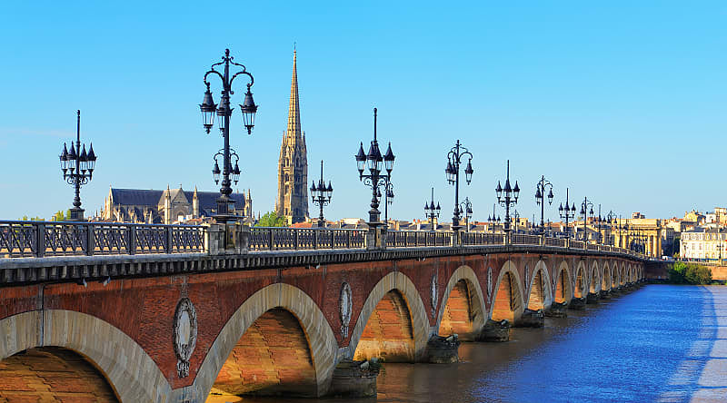 Bordeaux river bridge with St. Michel Cathedral in France Bordeaux river bridge with St. Michel Cathedral in France