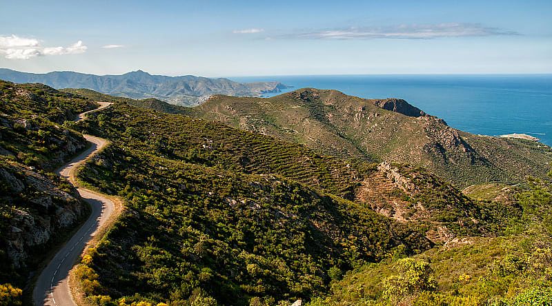 Winding road through mountains in the coast of Cap de Creus, on the way to Girona, Spain,