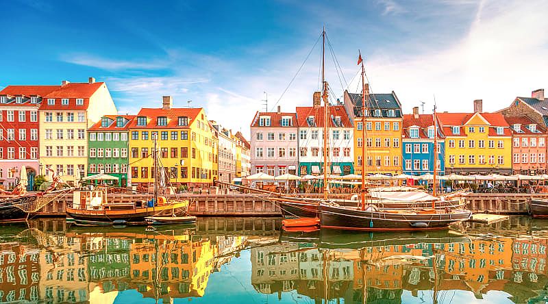 Nyhavn - 17th century port, canal and resting place in Copenhagen, Denmark