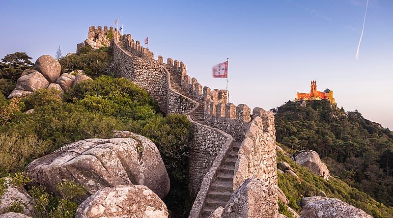 Moorish castle and Pena palace at sunset in Sintra, Portugal