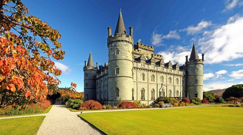 Luxury Scotland Tour: Highlands, Castles, and Lochs Inveraray Castle with autumn colors in Scotland