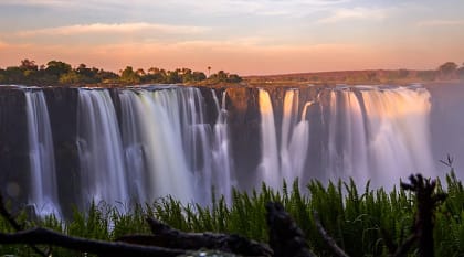 Victoria falls at sunset in Zimbabwe