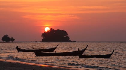 Sunset at Nai Yang beach in Phuket, Thailand.
