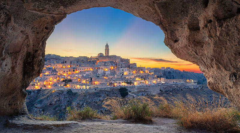 Medieval city of Matera in Southern Italy during a sunset Medieval city of Matera in Southern Italy during a sunset