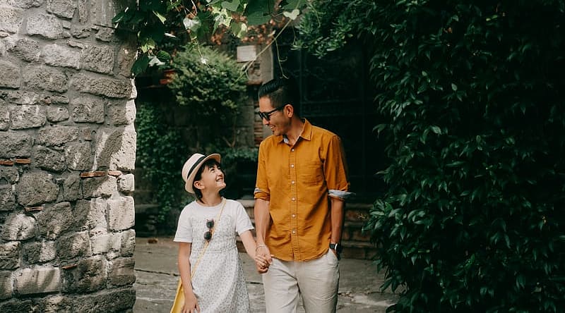 Father and daughter at a medieval town in Italy. Father and daughter at a medieval town in Italy.