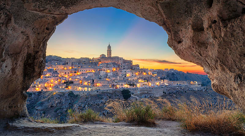 Medieval city of Matera in Southern Italy during a sunset Medieval city of Matera in Southern Italy during a sunset
