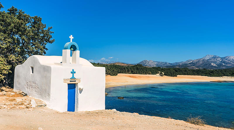 Chapel on Aliko Beach in Naxos Island, Greece.