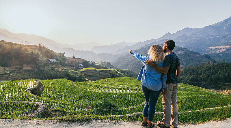 Couple enjoying view in Sapa Valley, Vietnam