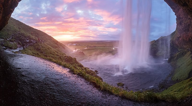 Experience a behind-the-scenes look at the glorious waterfall of Seljalandsfoss