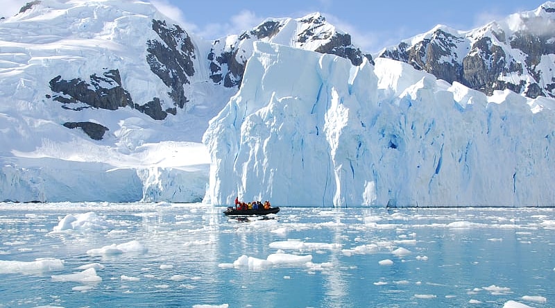 Exploring iceberg off the coast of Antarctica