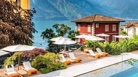 A swimming pool in front of Lake Como in Italy