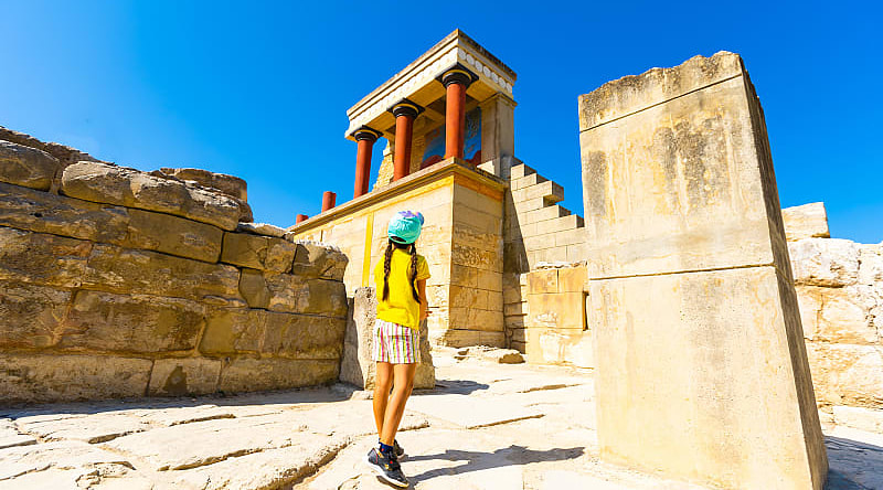 Family at Minoan Palace in Knossos, Crete, Greece.