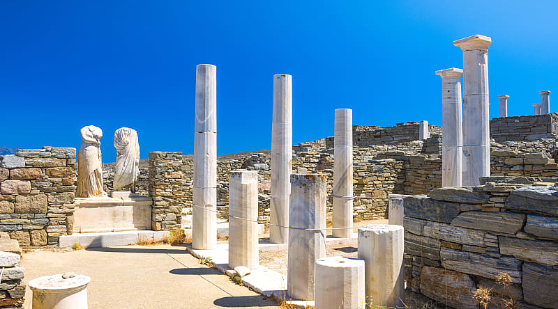 Ancient ruins in the island of Delos in Cyclades, one of the most important mythological, historical and archaeological sites in Greece