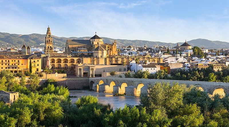 Morning view of the Cathedral, Mezquita and roman bridge in Córdoba, Spain