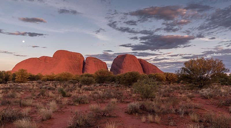 The moon above Kata Ttjuta in Australia
