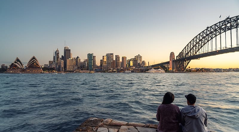 Couple enjoying view of Sydney Harbour in Australia