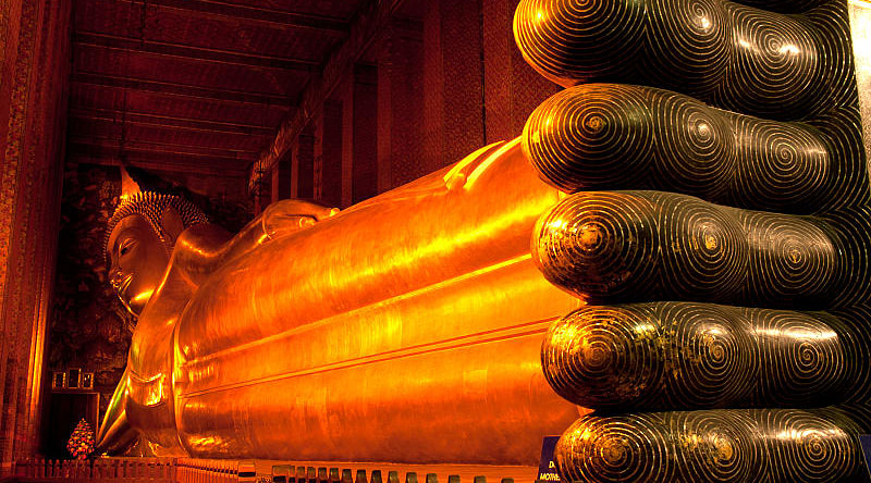 Golden reclining Buddha in Bangkok, Thailand.