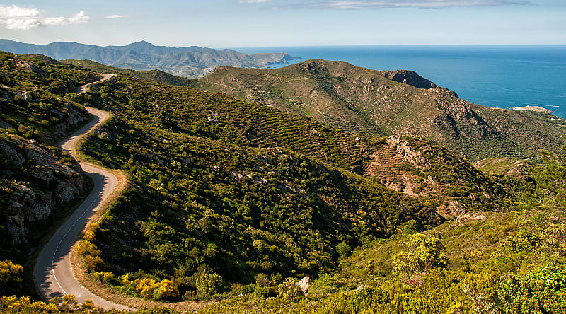 Winding road through mountains in the coast of Cap de Creus, on the way to Girona, Spain,