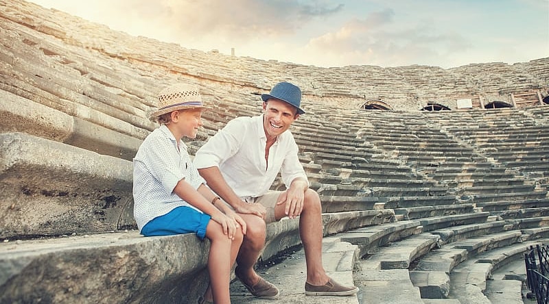Father and son at Hierapolis ruins in Pamukkale, Turkey