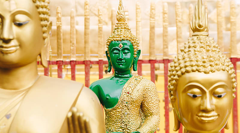 Statues in the golden Temple in Thailand