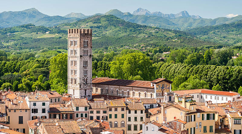 View of the city of Lucca and the chapel of the Basilica of St. Ferdinand - an ancient catholic church, Italy
