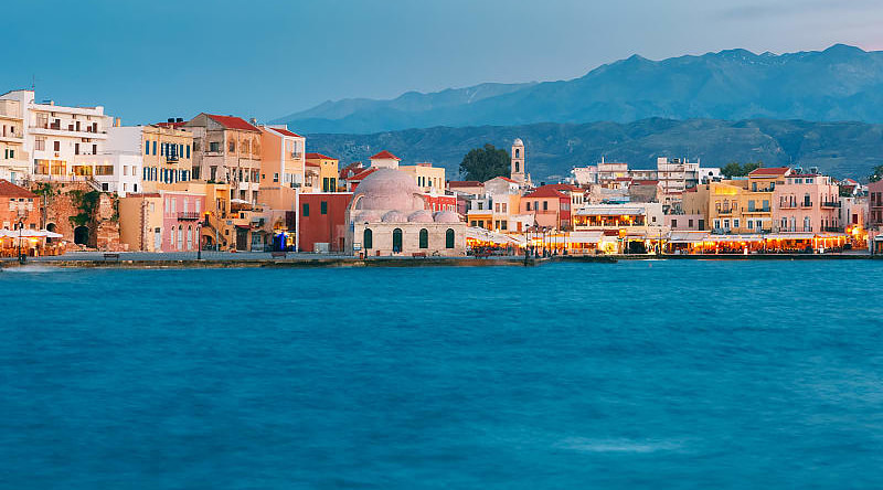 Venetian Quay of Chania with Kucuk Hasan Pasha Mosque during twilight blue hour, Crete, Greece
