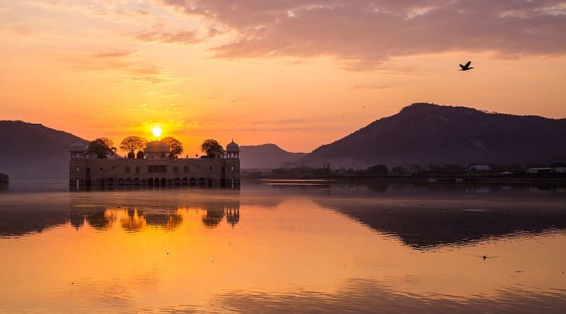 Romantic sunset over Jal Mahal on Man Sagar lake in Jaipur, India