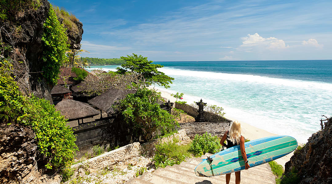 Surfer at a beach in Bali