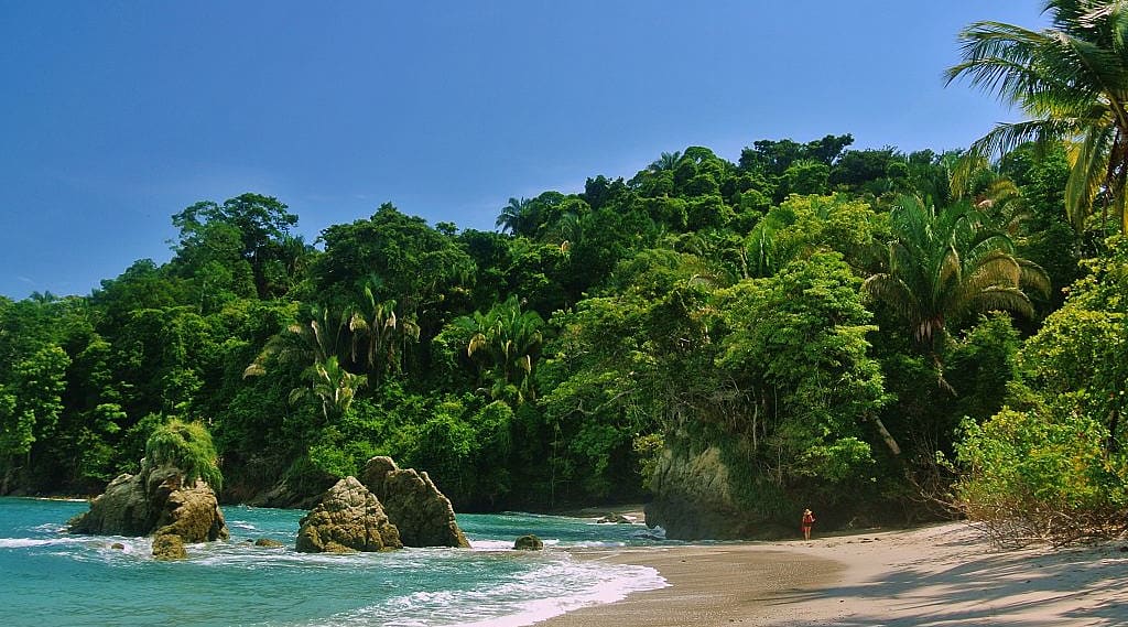 Woman walking on the beach in Costa Rica
