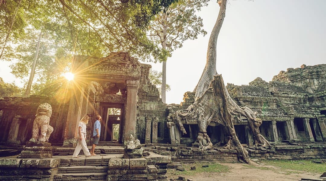 Couple exploring Angkor Wat in Siem Reap, Cambodia