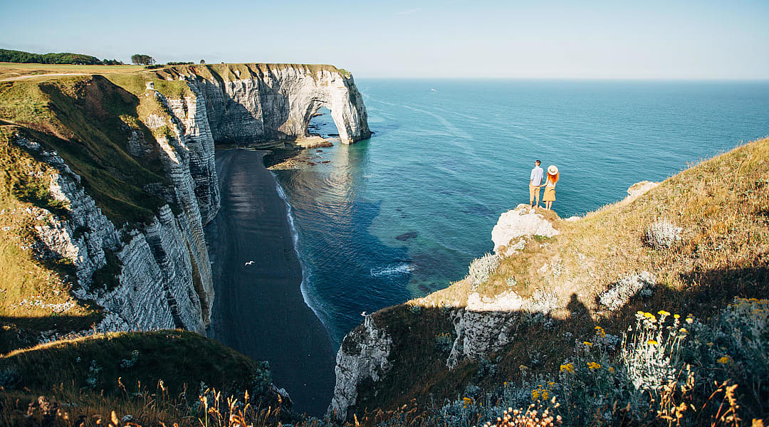 Couple at the Étretat Cliffs in France