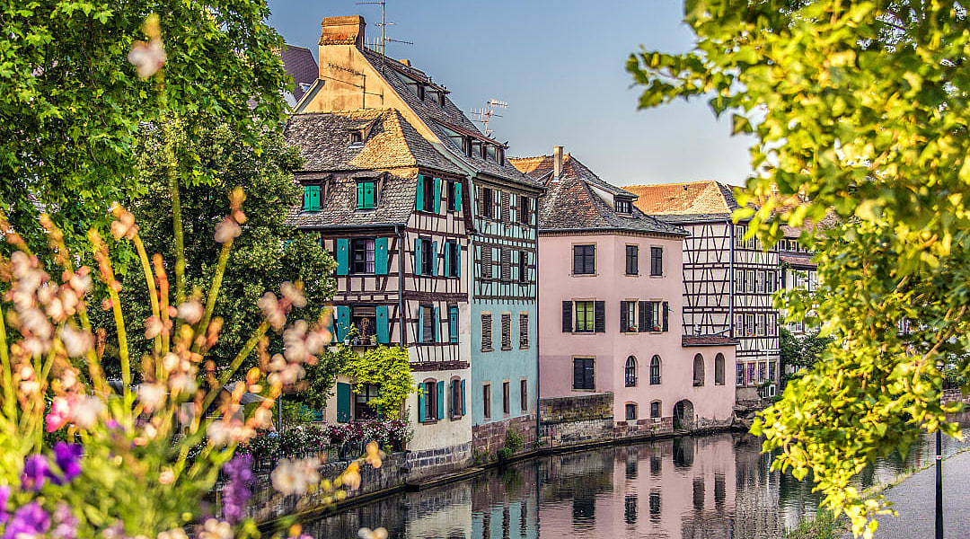 Colorful half-timbered houses along a canal in Strasbourg's Petite France district