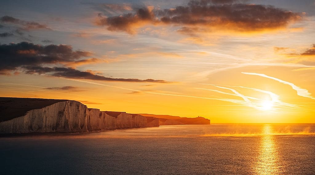 Sunrise over Seven Sisters chalk cliffs in East Sussex, England
