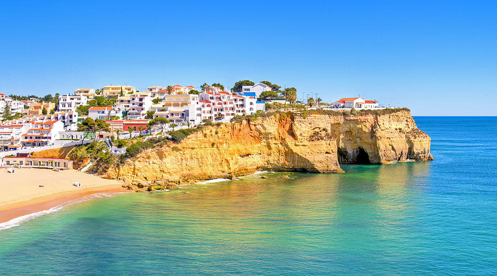 Beach and cliffside town of Carvoeiro, Portugal