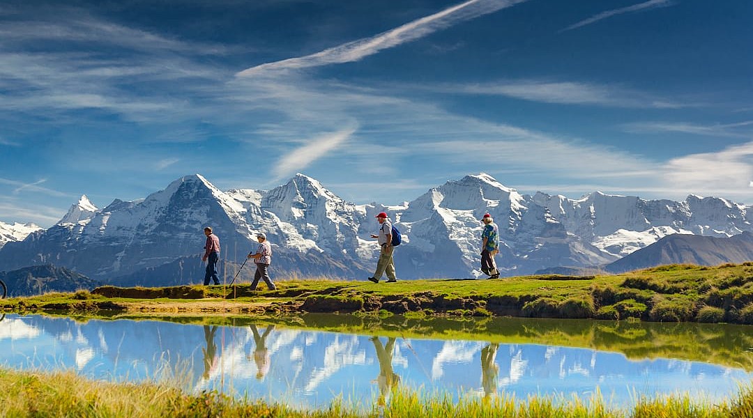 Seniors hiking in the Swiss Alps
