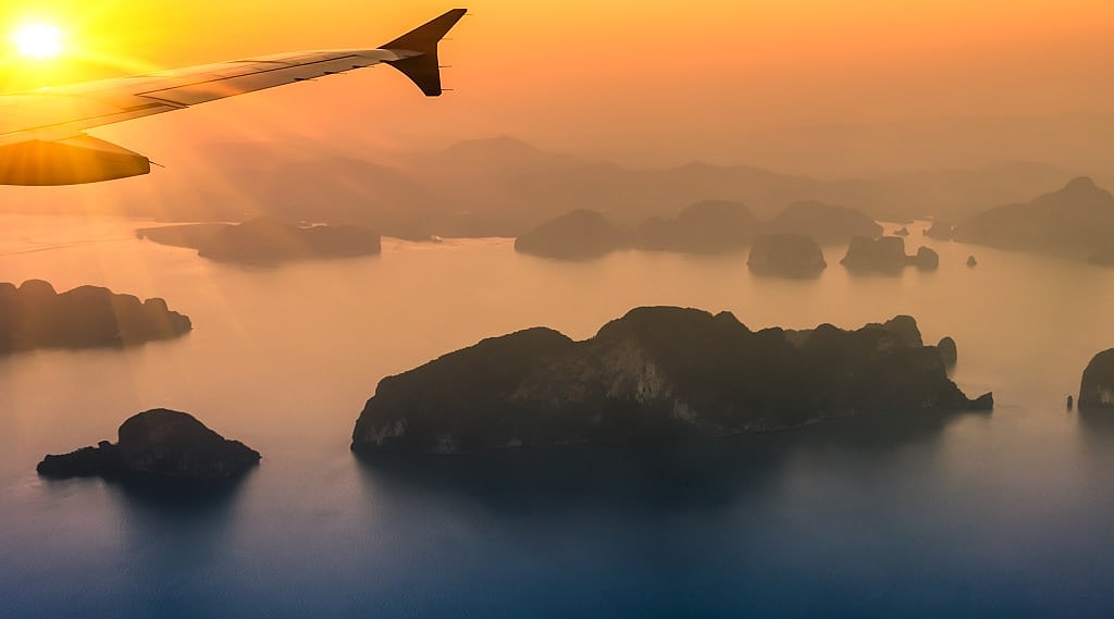 Flying over Phang Nga Bay at sunset
