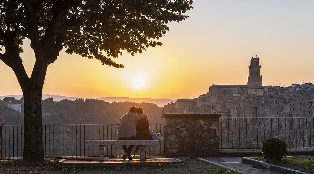 Couple in Pitigliano at sunset Tuscany, Italy