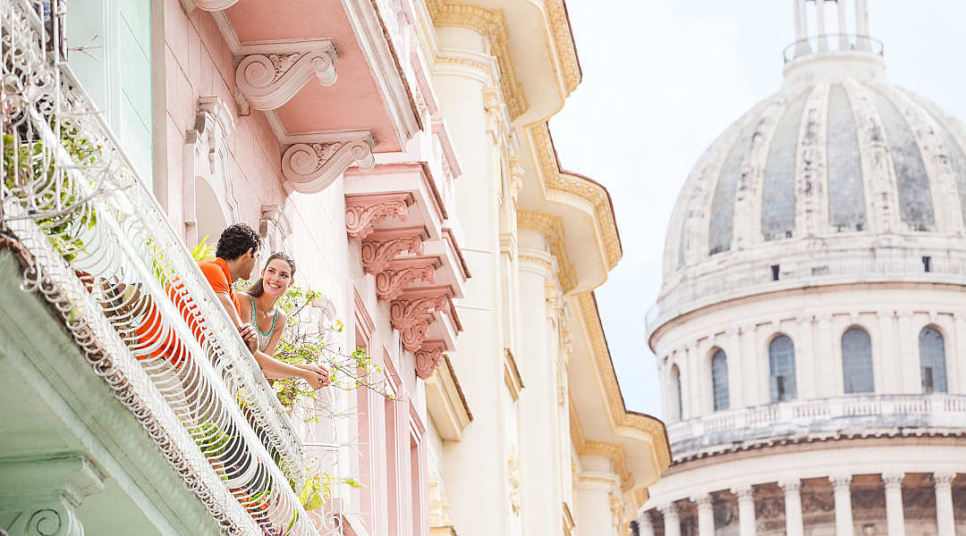 Couple on a balcony in Havana, Cuba