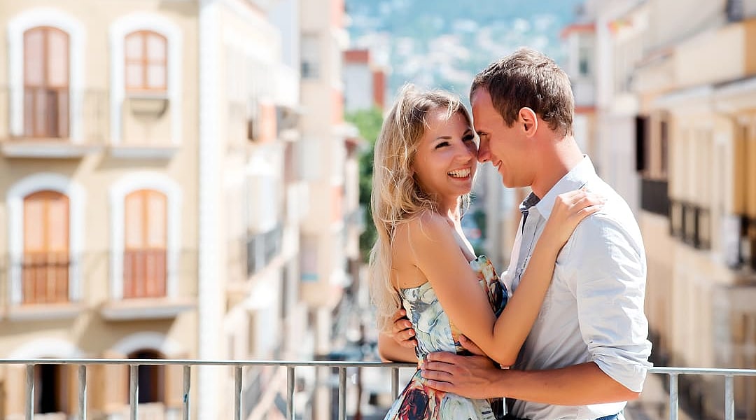Couple on balcony in Denia, CostaBlanca, Spain