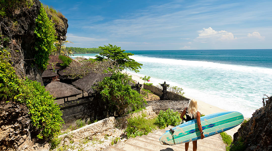 Surfer at a beach in Bali