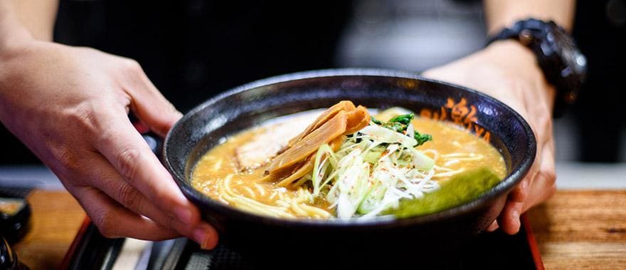 Japan Tour - Waiter Serving Ramen