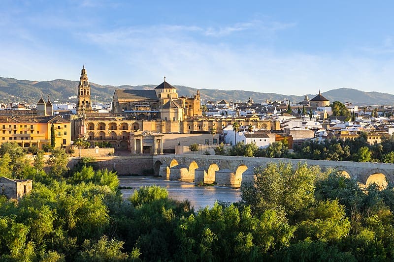 Morning view of the Cathedral, Mezquita and roman bridge in Córdoba, Spain