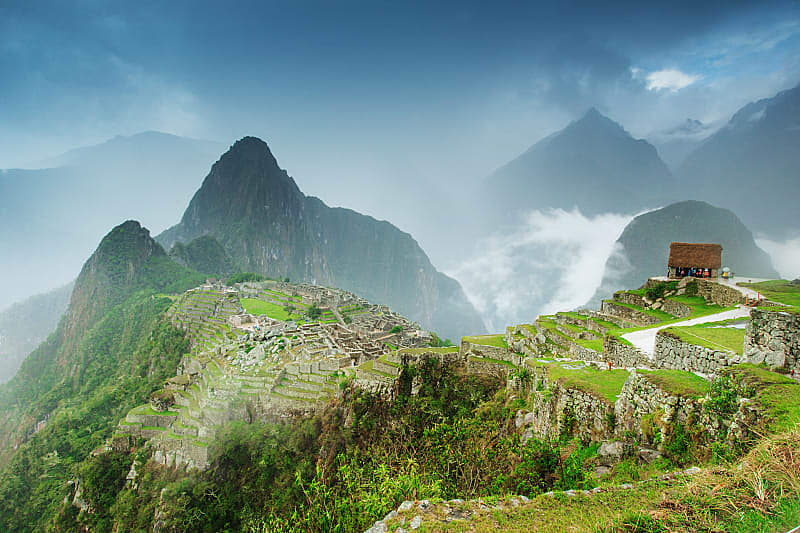 The breathtaking majesty of Machu Picchu sitting in the clouds.