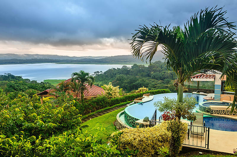 Luxurious vacation in the middle of the rainforest, view of the Arenal Lake and the jungle. Costa Rica