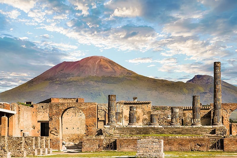 Ancient Roman city of Pompeii and Vesuvius in the background